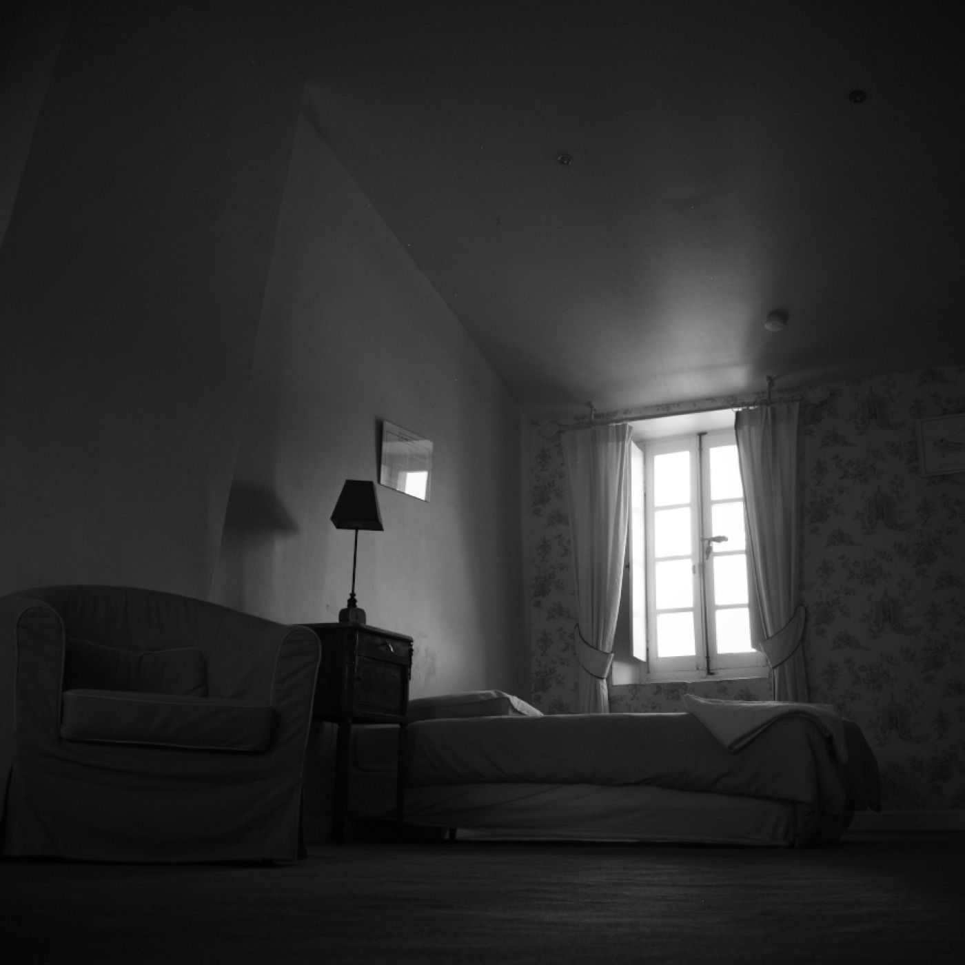 The bedroom, on the upper floor of the orangery